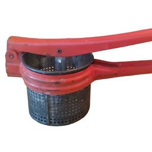 Antique kitchen tool potato ricer display farmhouse decor